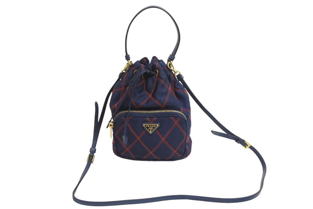 Prada shoulder bag drawstring closure check triangle